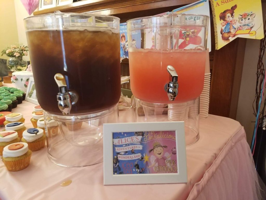 iced tea and pink lemonade saying 'alice's adventures in wonderland' and 'pinkalicious' childrens book