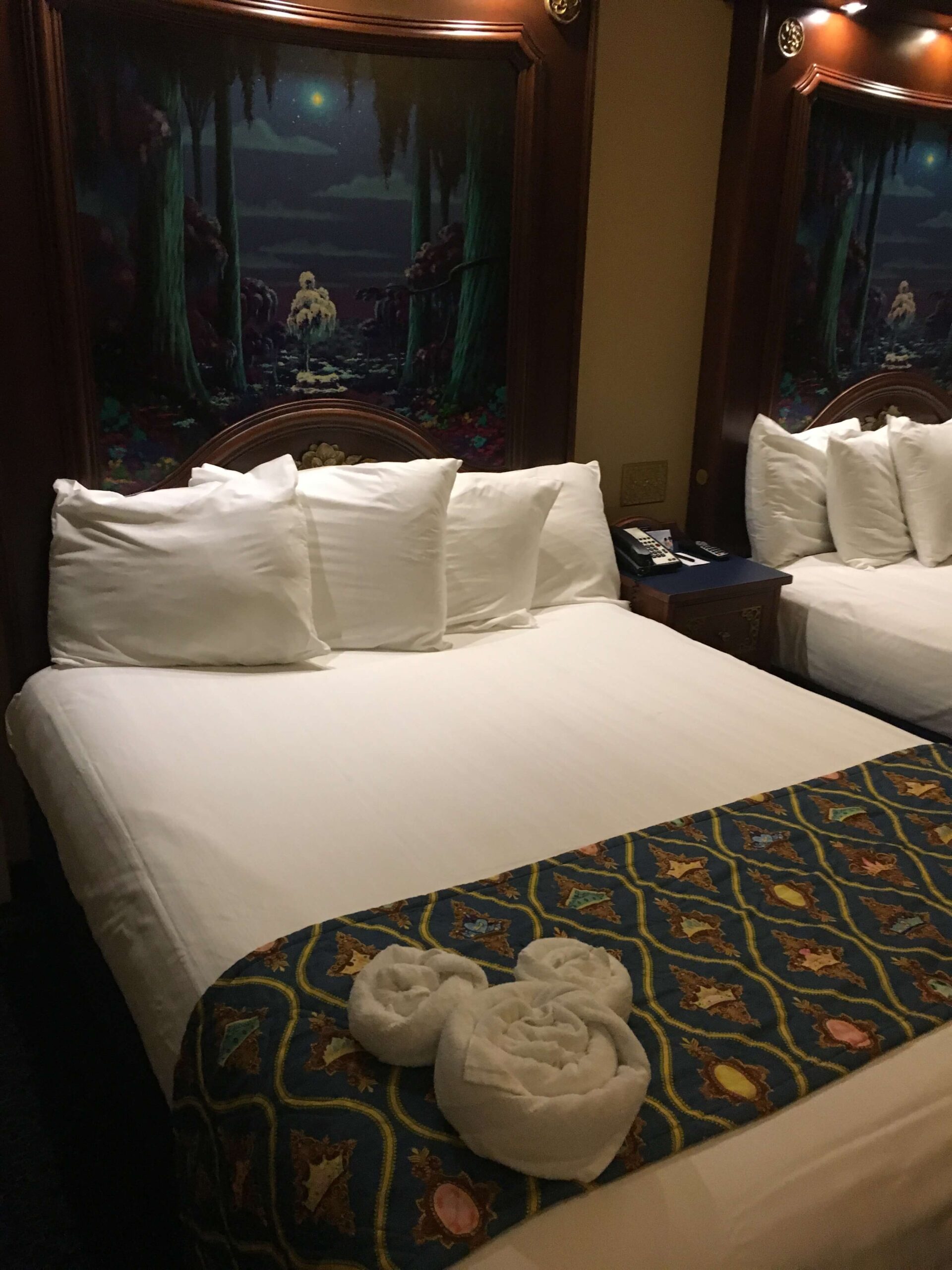 our bed and hotel room at Disney's port orleans resort - riverside 